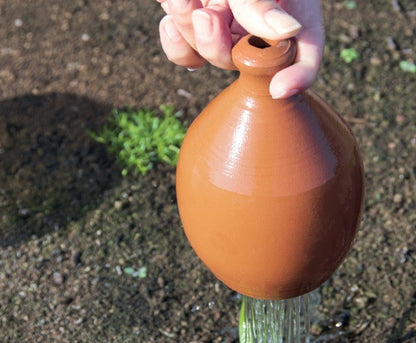 Thumb Watering Can