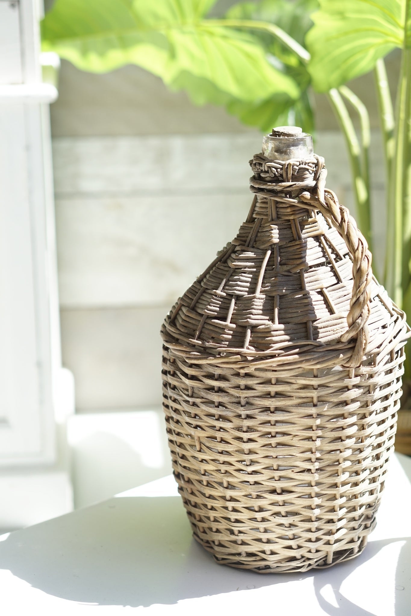 Antique Bottles in Wicker