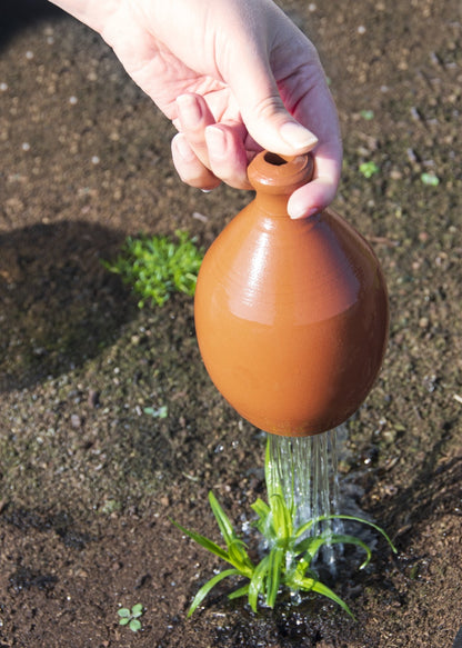 Thumb Watering Can